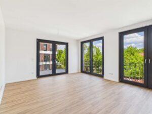 Wohnzimmer + Zugang zur Loggia